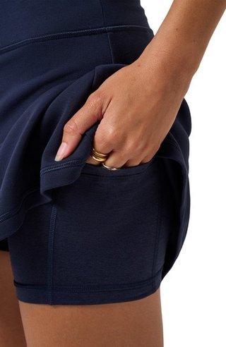 Travis Mathew Skyloft Soft A-line spódnica golfowa, granatowa