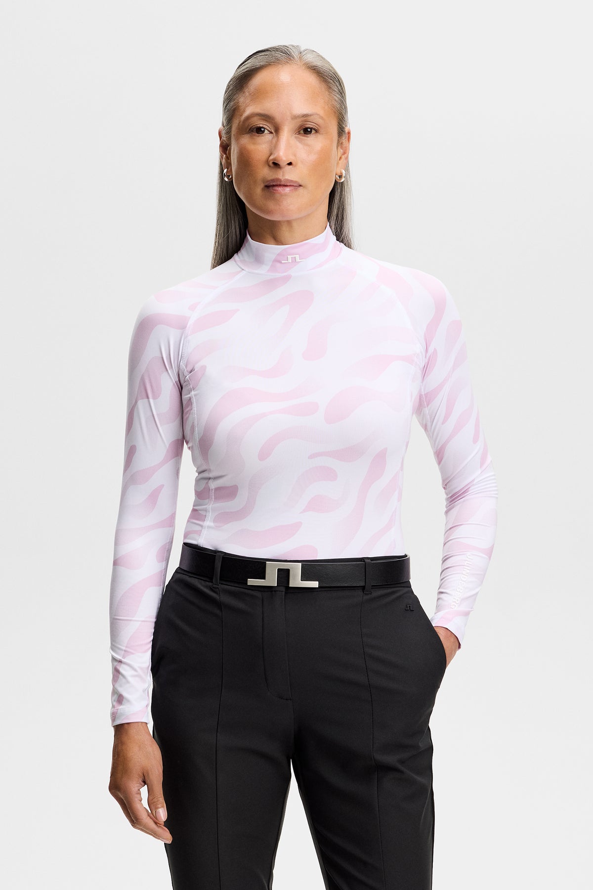 J.Lindeberg Ella Print Compression Top Bunker Fade White Orchid – front view on model